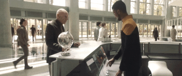 If looks could kill …  Jean-Luc arrives for his appointment with the Starfleet Commander in Chief.