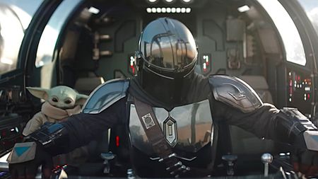 Pedro Pascal as The Mandalorian and Grogu are shown in the trailer for The Mandalorian and Grogu.
