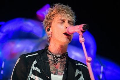 Musician Machine Gun Kelly performs onstage during the NoCap x Travis Barker House of Horrors concert at Private Residence on October 19, 2021 in Malibu, California