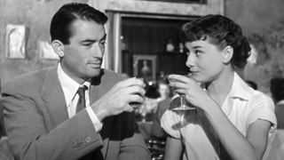 gregory peck and audrey hepburn toast in roman holiday