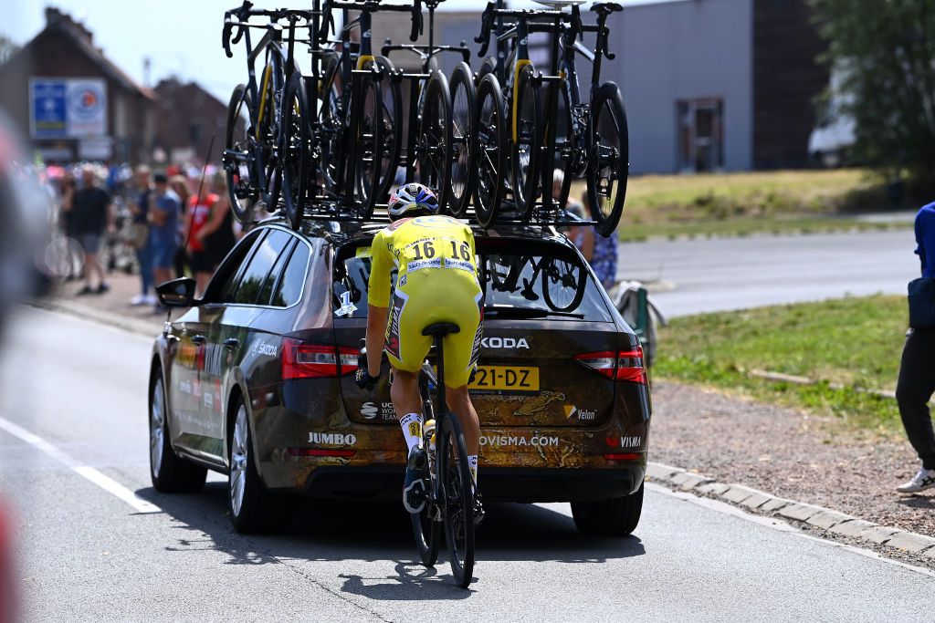WALLERS FRANCE JULY 06 Wout Van Aert of Belgium and Team Jumbo Visma Yellow Leader Jersey dropped from the peloton after being involved in a crash during to the 109th Tour de France 2022 Stage 5 a 157km stage from Lille to WallersArenberg TDF2022 WorldTour on July 06 2022 in Wallers France Photo by Tim de WaeleGetty Images