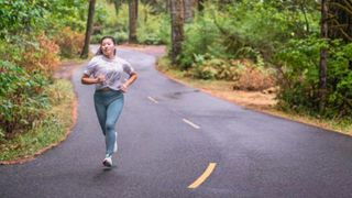 Woman running in Altra zero-drop shoes