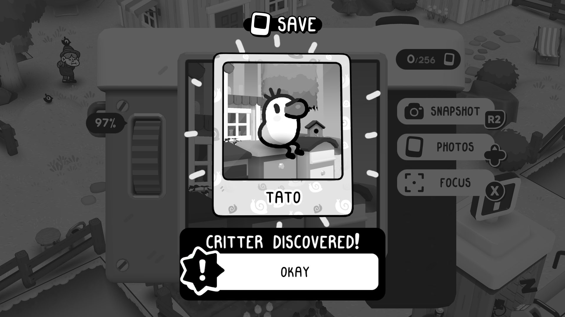 Saving a photograph of a Tato in Toem 2, a critter