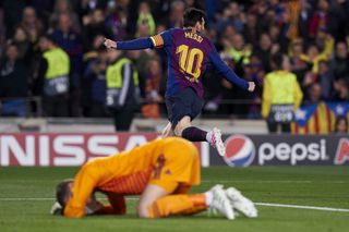 Lionel Messi peels away in celebration after scoring for Barcelona against Manchester United in the Champions League in 2019 as goalkeeper David de Gea looks dejected.