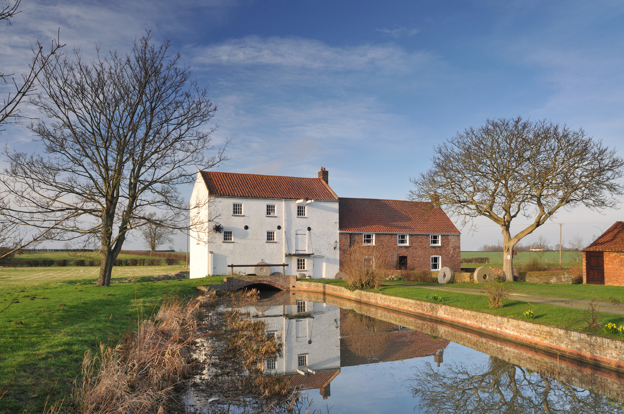 watermill, pond, blue sky, trees