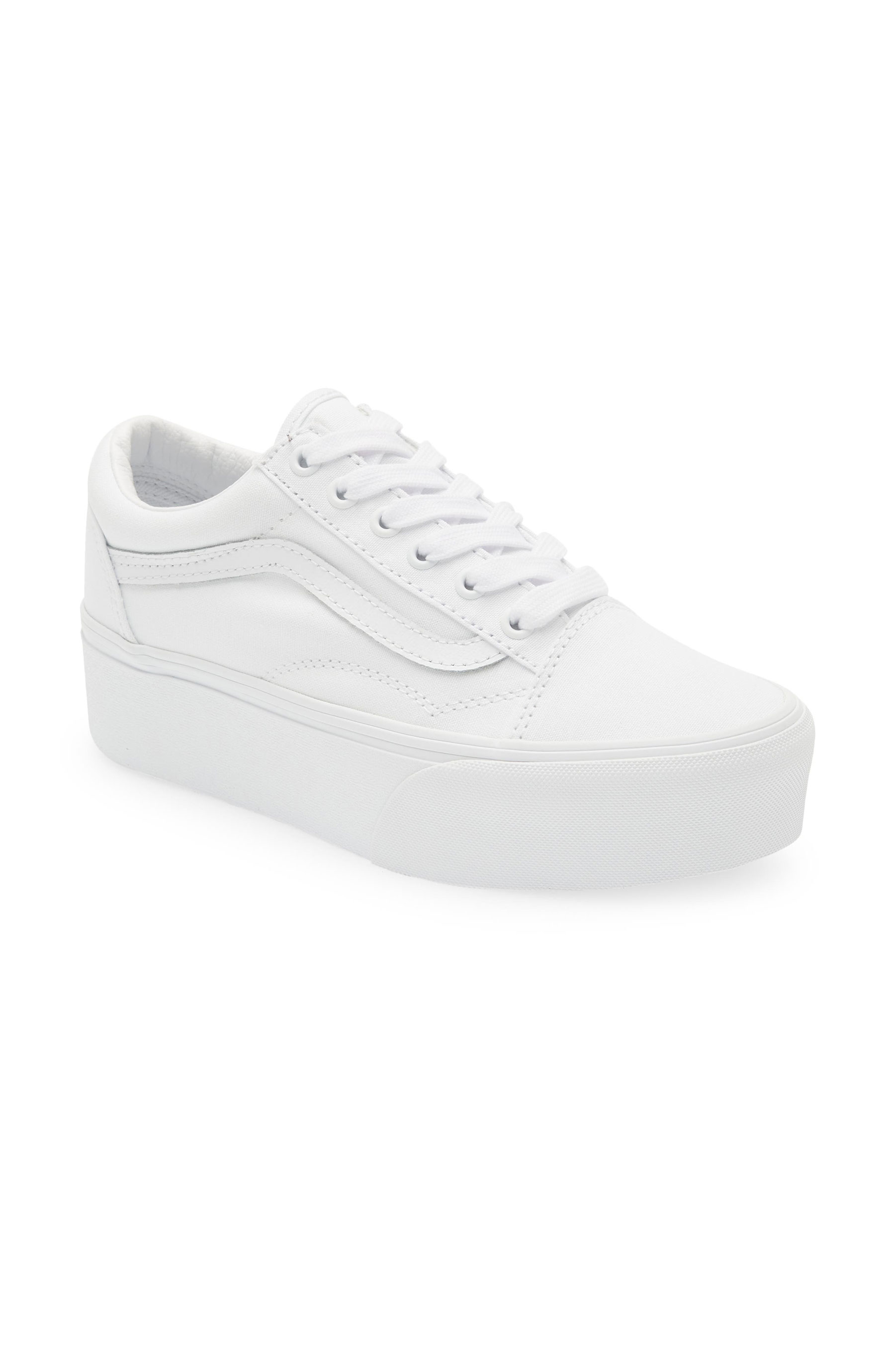 white platform sneakers by Vans