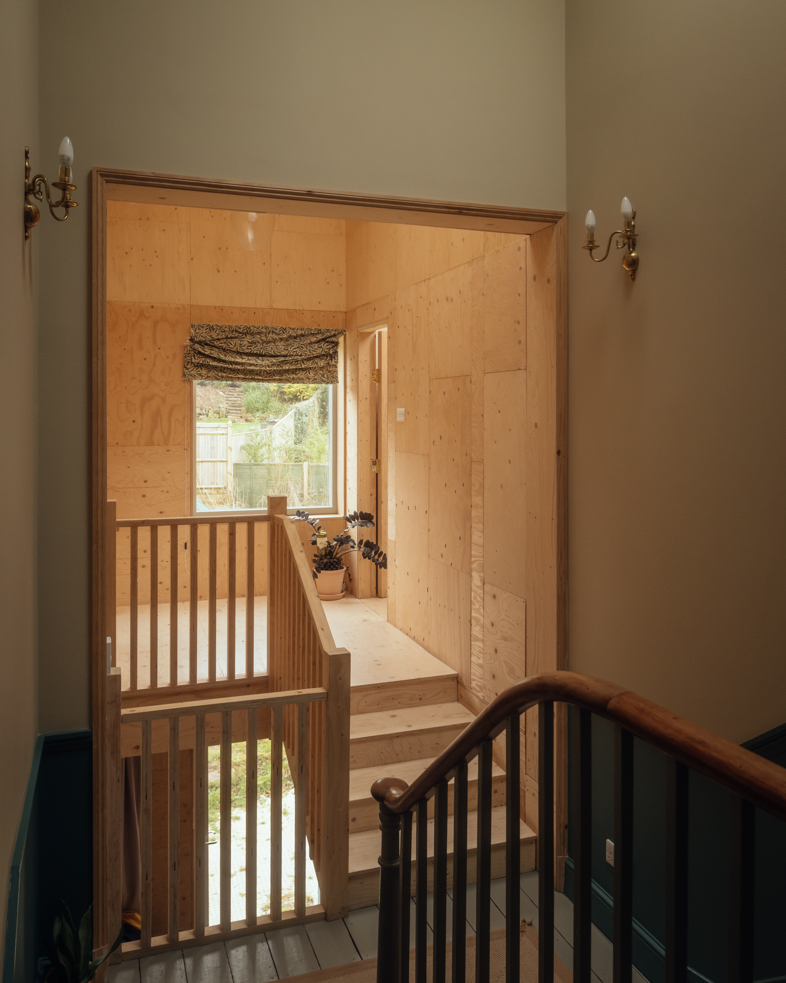 The stairwell marks the junction between old and new
