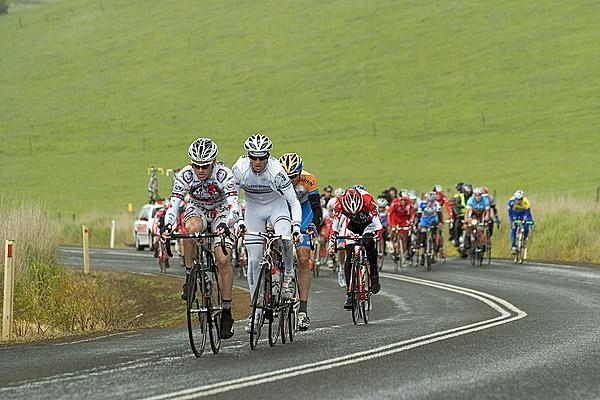 Riders climb their way nearing five kilometres to go before the township of Cobden.