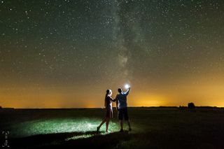 Couple Under the Hungarian Night Sky