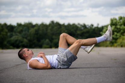 Man performing bicycle crunches