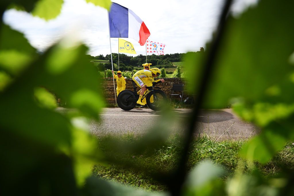 GEVREYCHAMBERTIN FRANCE JULY 05 Tadej Pogacar of Slovenia and UAE Team Emirates Yellow Leader Jersey sprints while fans cheer during the 111th Tour de France 2024 Stage 7 a 253km individual time trial stage from NuitsSaintGeorges to GevreyChambertin UCIWT on July 05 2024 in GevreyChambertin France Photo by Dario BelingheriGetty Images