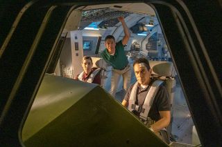 Samantha Stratton (Carly Pope, left), Jim Reynolds (José Zúñiga, right) and Max Everett (Leith Burke) on the space shuttle flight deck in the "Quantum Leap" episode "Atlantis."