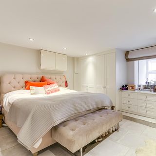 bedroom with bespoke furniture and shoes rack