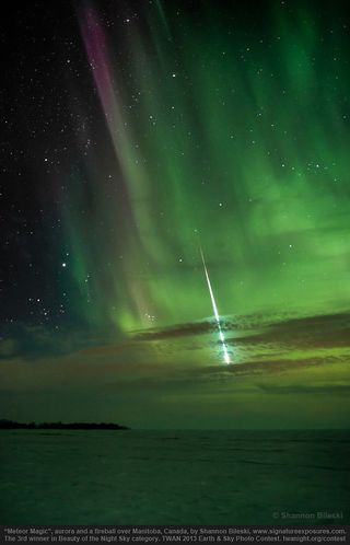 3rd Place in Beauty of the Night Sky category goes to "Meteor Magic" by Shannon Bileski for her March 2013 outstanding capture of a streaking fireball and colorful aurora over a snow-covered lake in Canada.