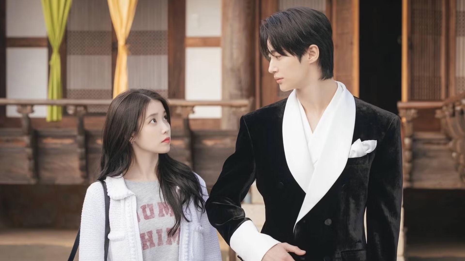IU as Seong Hui-ju and Byeon Woo-seok as Crown Prince I-AN in 'Perfect Crown.'