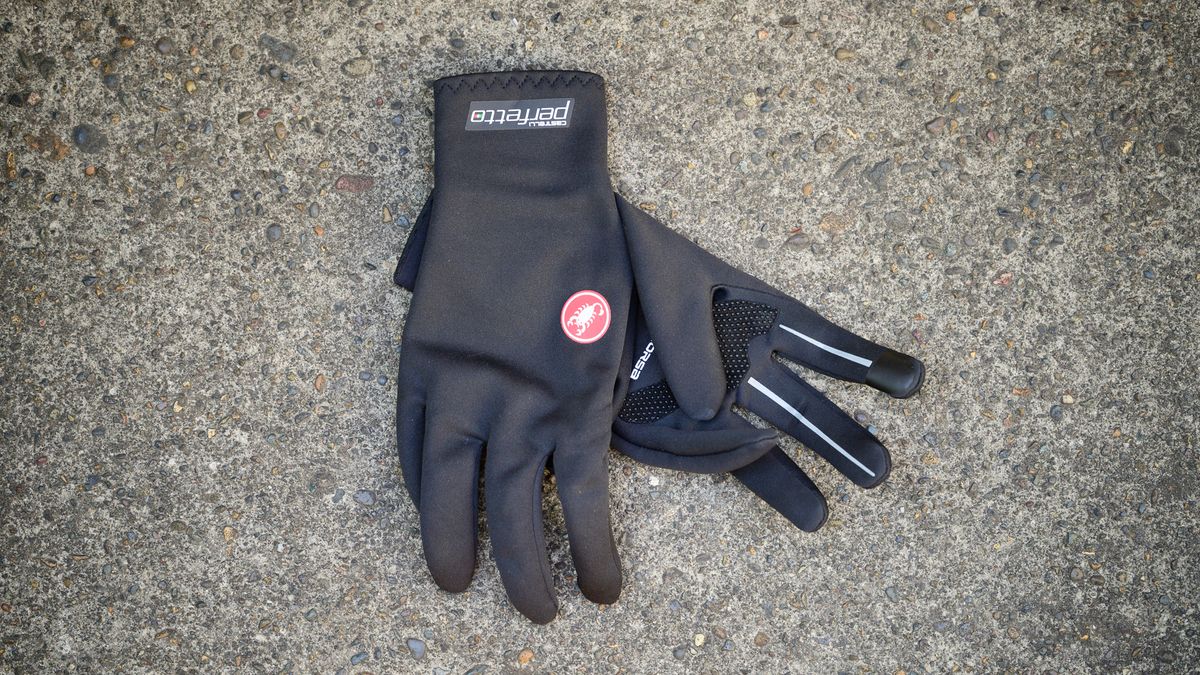 Black Castelli Perfetto RoS gloves on some concrete