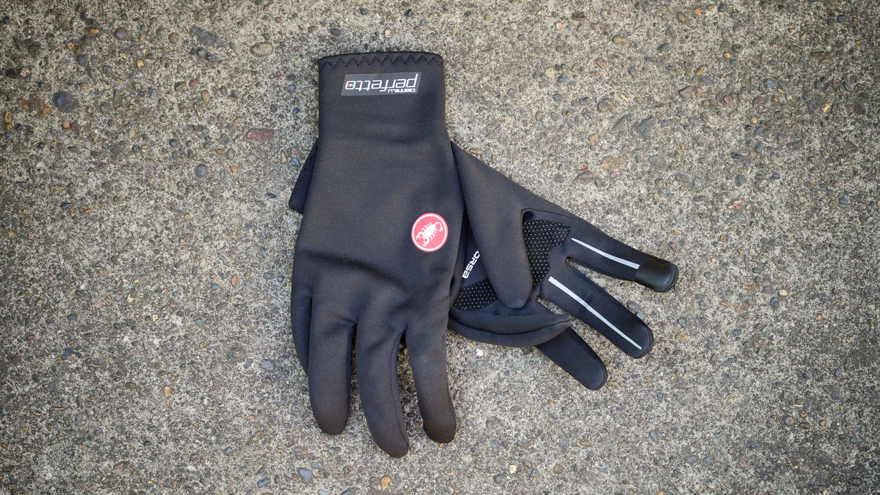 Black Castelli Perfetto RoS gloves on some concrete