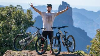 Sam Pilgrim with two Canyon mountain bikes
