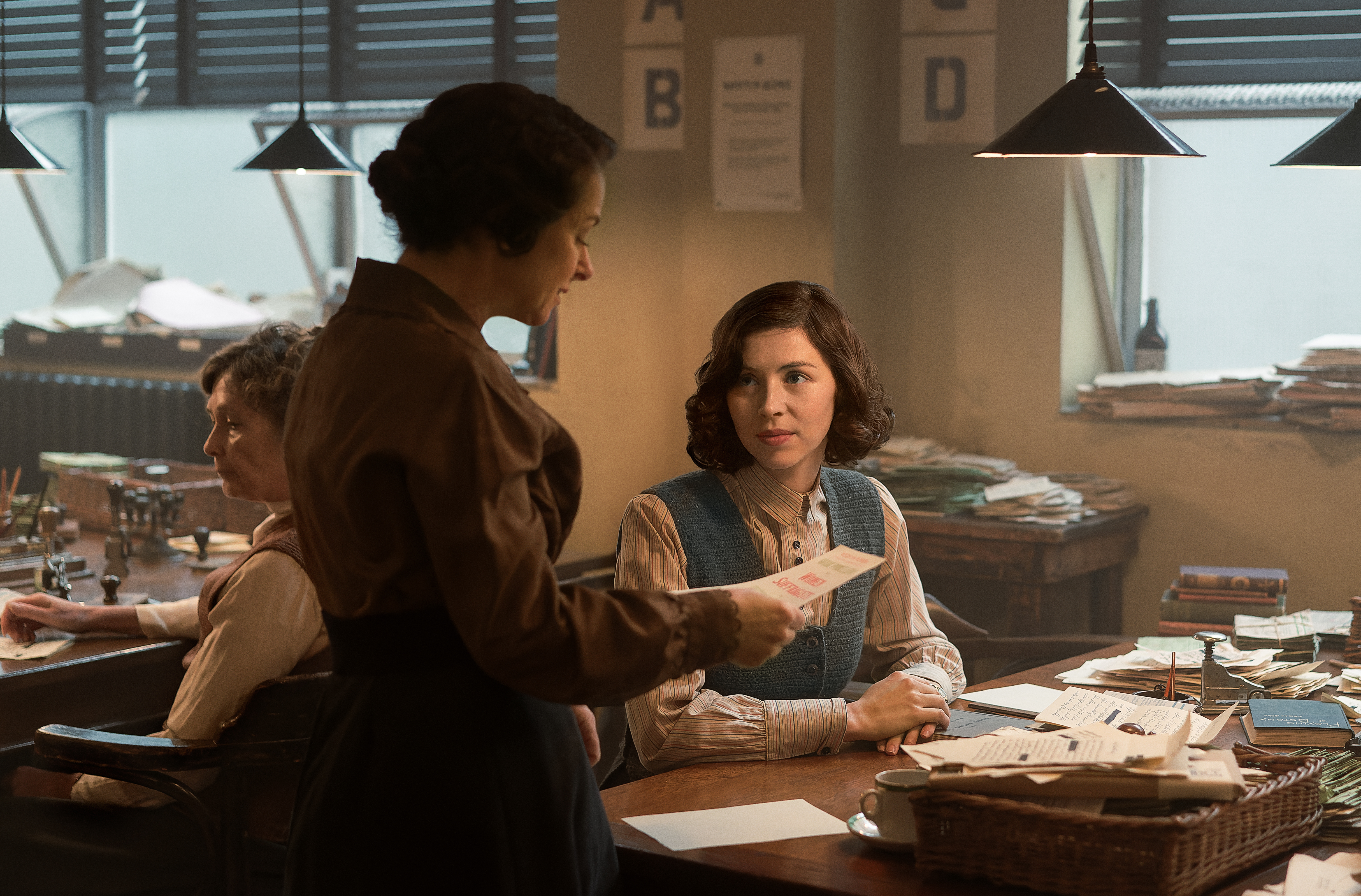 Julia at work in an office in World War One.