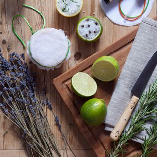 Lavender, rosemary, lime and salt on chopping board