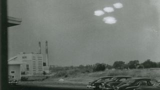 On July 16, 1952, Coast Guard seaman Shell Alpert took this photo of four roughly elliptical blobs of light in formation through the window of his photographic laboratory near Salem, Massachusetts. The U.S. Air Force's UFO task force, Project Blue Book, investigated the image and deemed it "unexplained."