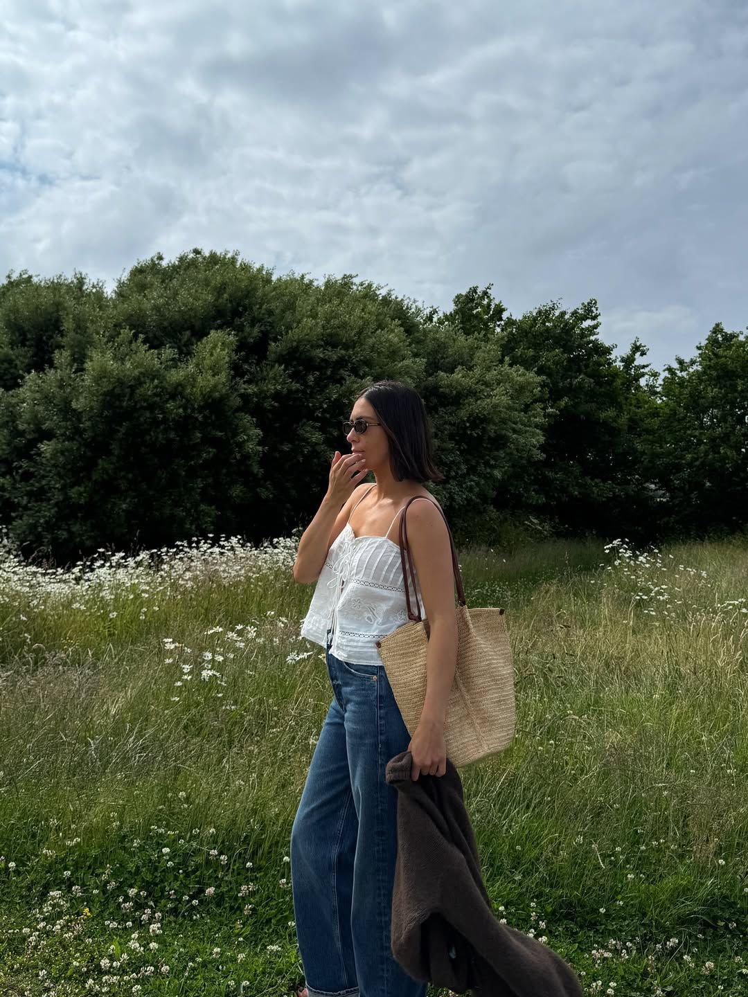 @_jessicaskye wearing wide-leg jeans and top