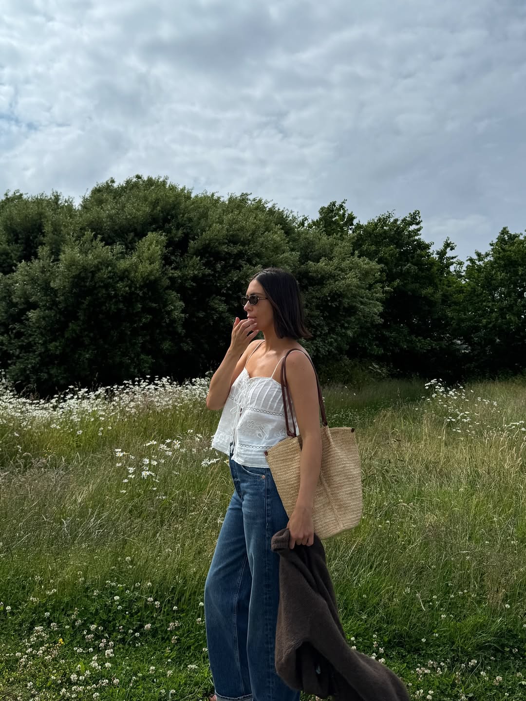 @_jessicaskye wearing wide-leg jeans and top