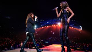 Singer-songwriters Alanis Morissette (L) and Taylor Swift perform onstage during Taylor Swift The 1989 World Tour Live In Los Angeles at Staples Center on August 24, 2015 in Los Angeles, California. 