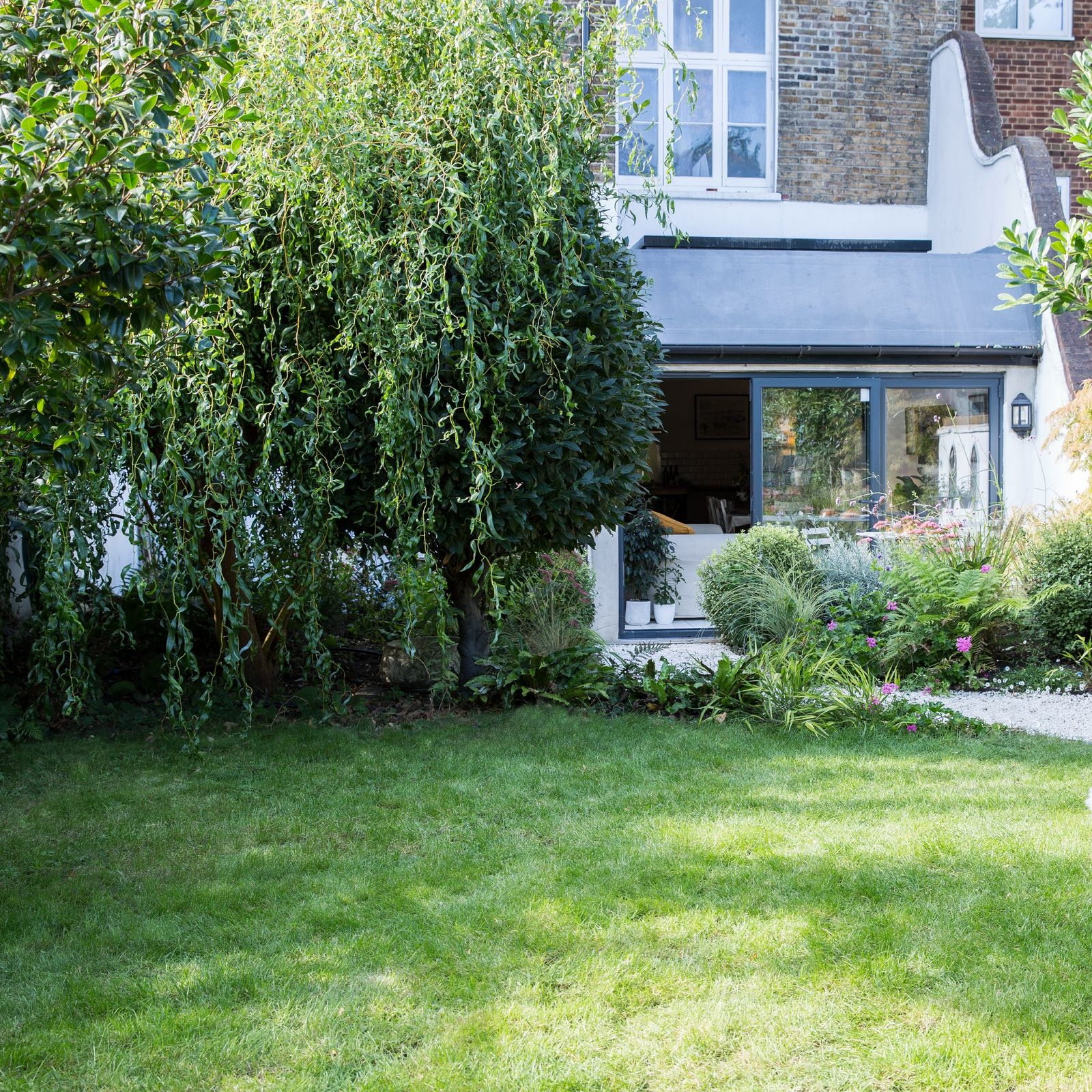 how-to-level-a-lawn-an-easy-guide-to-banish-dips-and-bumps-ideal-home