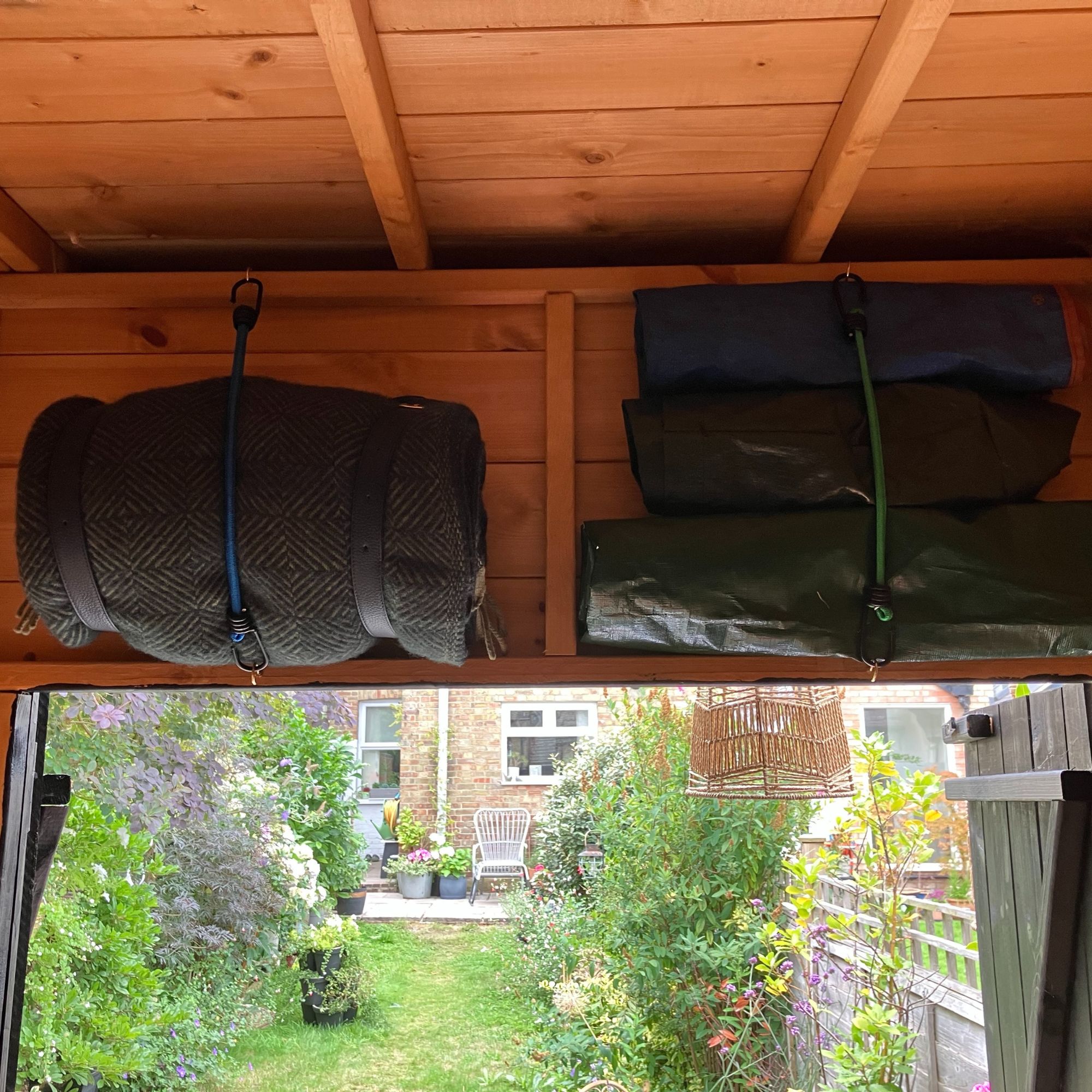 bungee cord shed storage in roof area