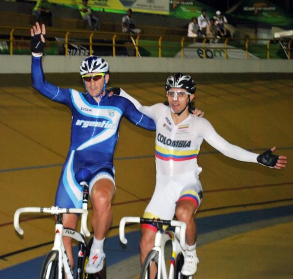 Dario Angel Colla and Carlos Uran Arroyave celebrate after the scratch race.