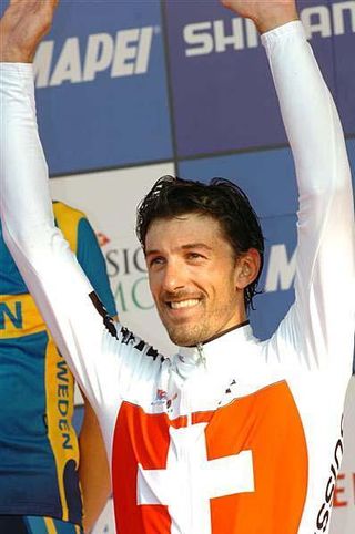 Fabian Cancellara celebrates win number three in the world championship time trial.