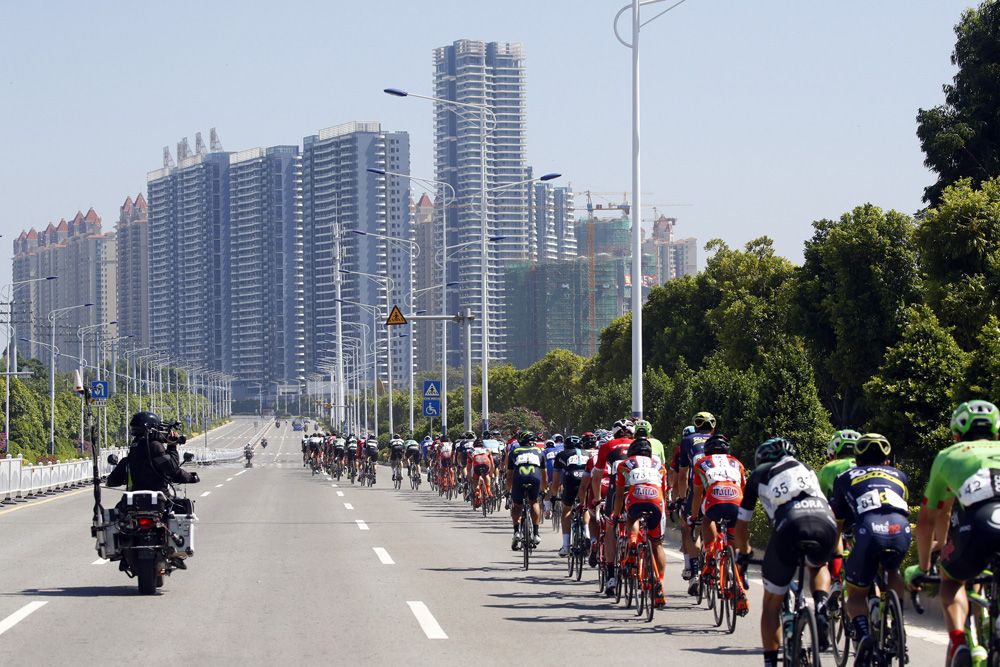 The peloton heads back to Beihai City