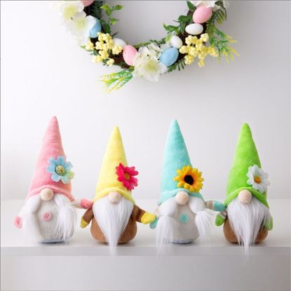 room with floral garland on white wall and easter gonks