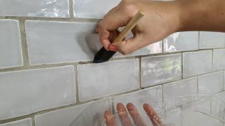 Sealing grout in tiles