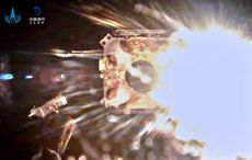 China's Chang'e 5 moon sample-return ascent vehicle lifts off from the lunar surface in this view captured by the lander itself at Mons Rumker in the Ocean of Storms on Dec. 3, 2020.