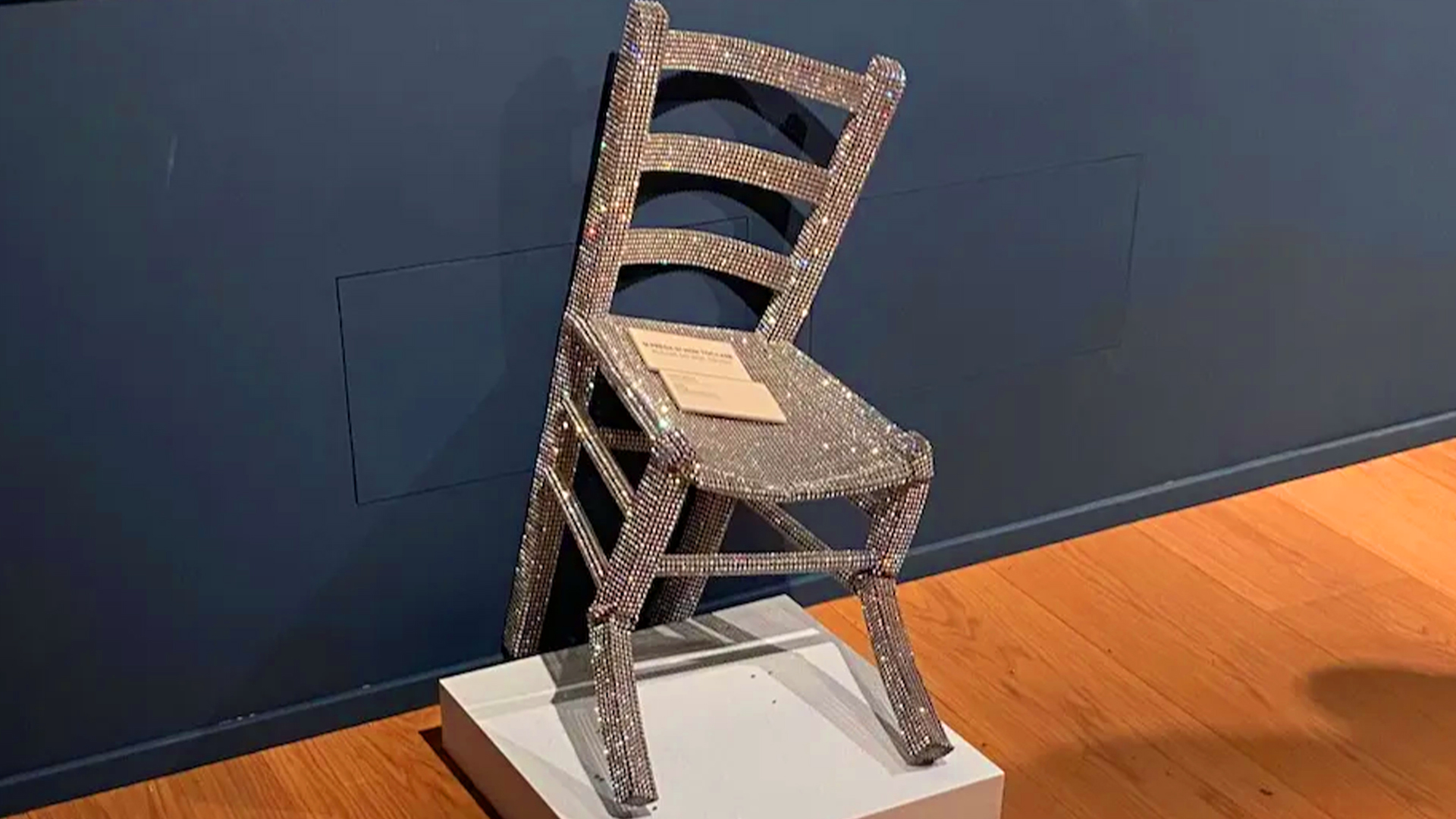 Destroyed chair in an art gallery