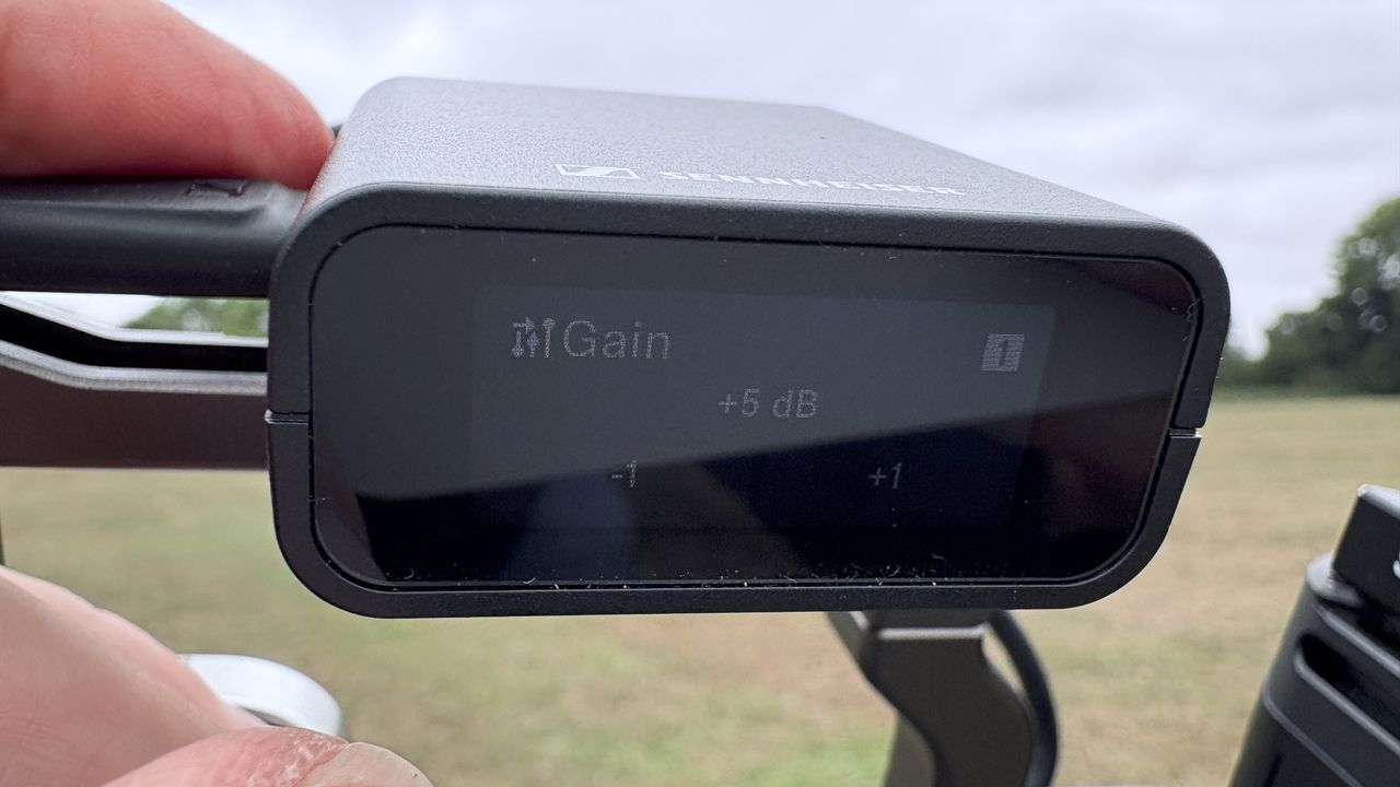 Close-up of the receiver&rsquo;s screen with the mic&rsquo;s gain controls visible. It has been set to +5dB
