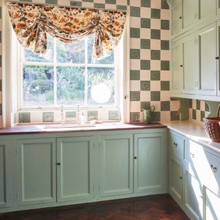 kitchen with green and white check wall tile design