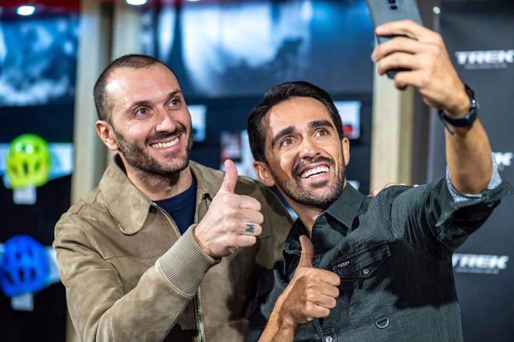 Ivan Basso and Alberto Contador take a selfie at a ceremony welcoming Gruppo Uvet to Contador's foundation.
