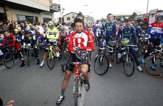 Fumiyuki Beppu and the Tirreno-Adriatico peloton respect a minutes silence for the victims of the Japan earthquake