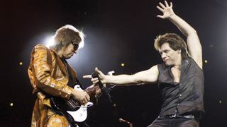 Richie Sambora, left, and Jon Bon Jovi perform on stage at the United Center, in Chicago, February 24, 2008