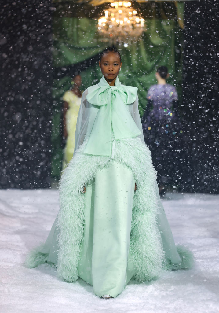 Richard Quinn London Fashion Week AW25 model wears green featured cape dress
