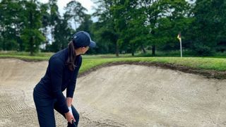 Jess Ratcliffe hitting out of a bunker