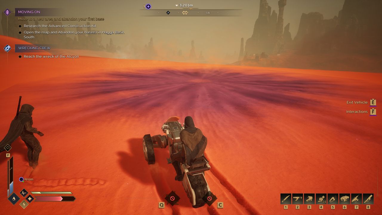 Dune: Awakening spice sand location - Two players (one on a sandbike) looking at spice sand on the ground in front of them.