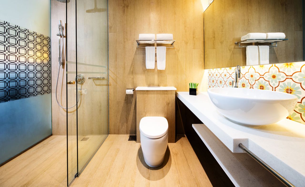 Guest bathroom with walk in shower &amp; patterned tiles