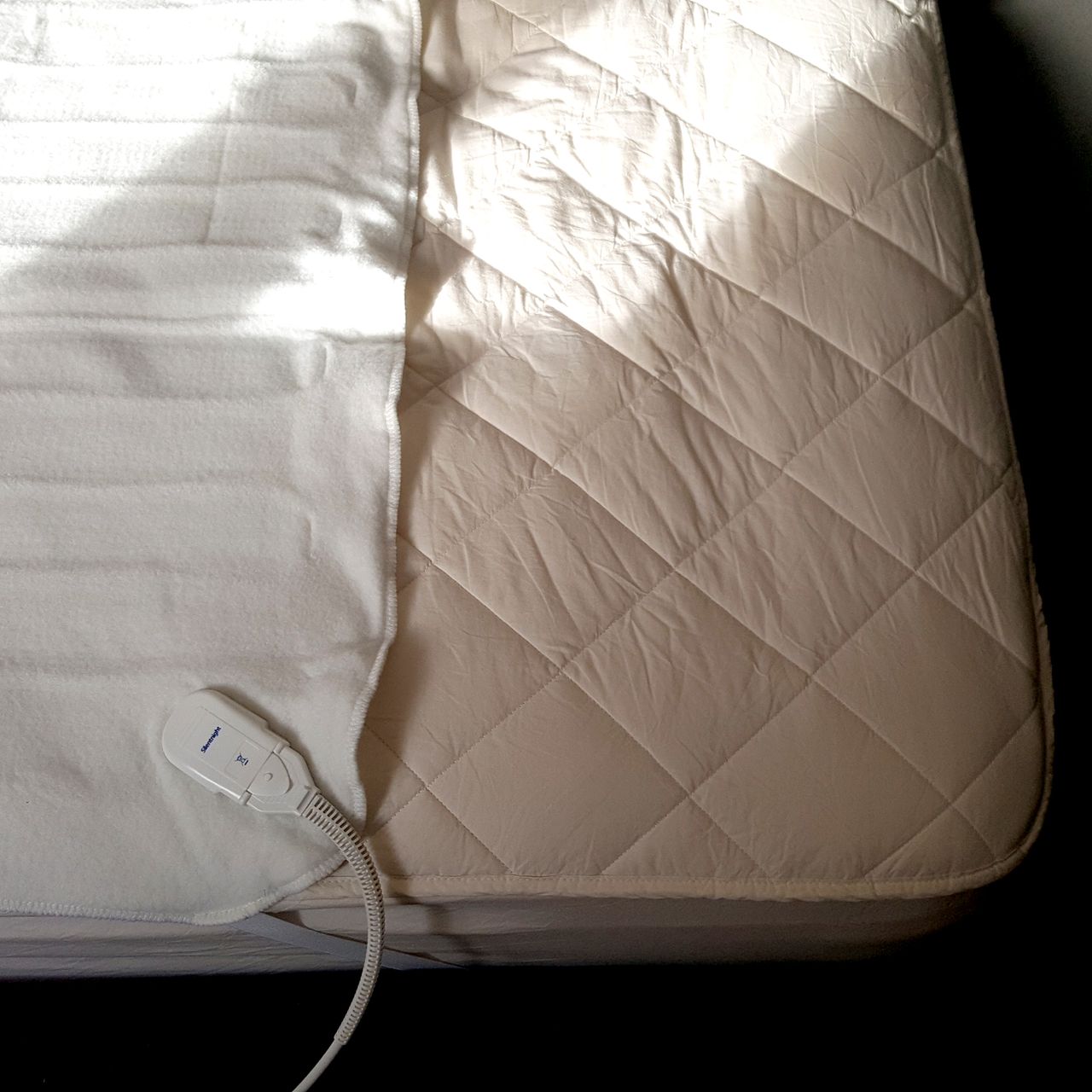 The Silentnight Yours &amp; Mine Dual-Control Electric Blanket being tested on a mattress
