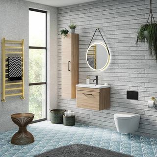 wood effect wall hung vanity unit with inset sink and black tap in modern bathroom