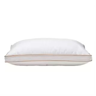Saatva Latex Pillow against a white background.