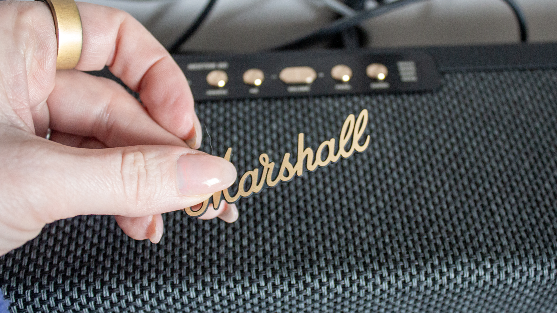 an image of marshall's heston 60 soundbar in a simple white room